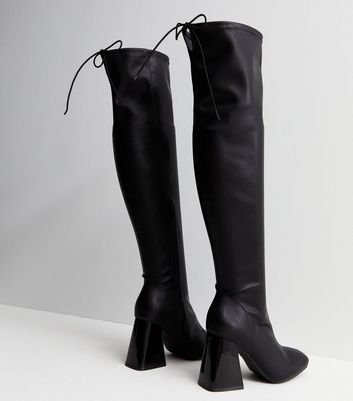 Black over the shop knee flared heel boots