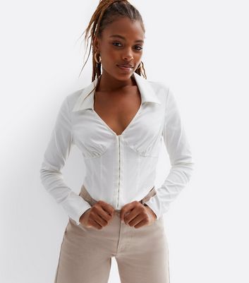 https://media2.newlookassets.com/i/newlook/841882710/womens/clothing/tops/white-collared-long-sleeve-corset-top.jpg