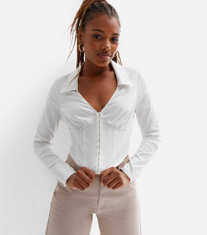 https://media2.newlookassets.com/i/newlook/841882710/womens/clothing/tops/white-collared-long-sleeve-corset-top.jpg?strip=true&qlt=50&w=720