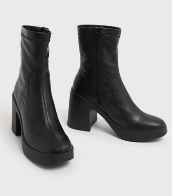 Mid heel clearance black sock boots