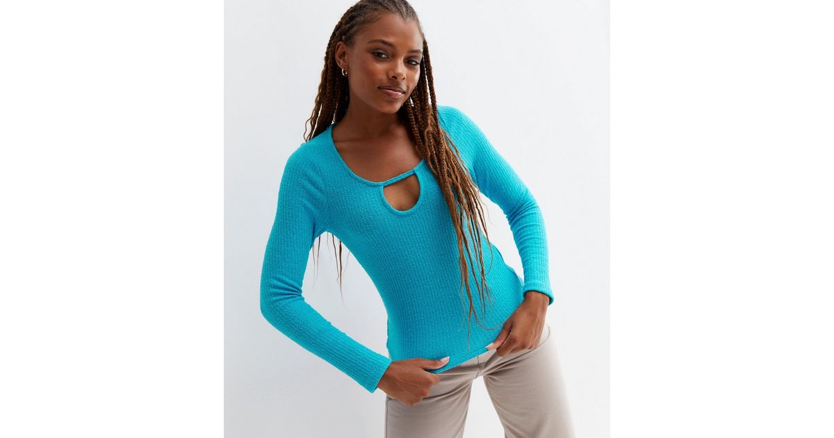 turquoise long sleeve top