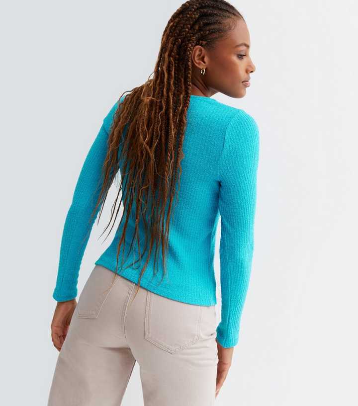 turquoise long sleeve top