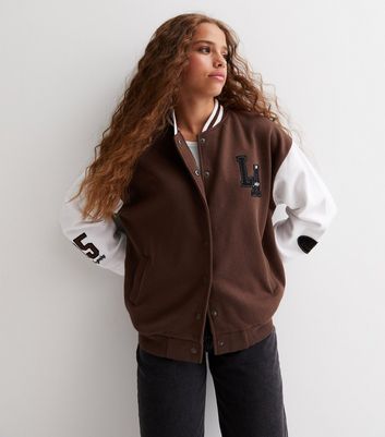 brown varsity jacket outfit for women｜TikTok Search
