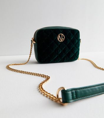 Dark green store velvet bag