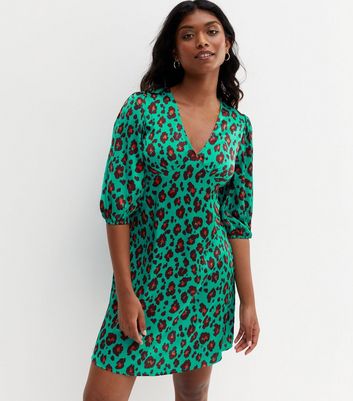 Emerald green store leopard print dress