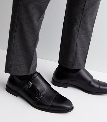 Black double outlet monk strap shoes