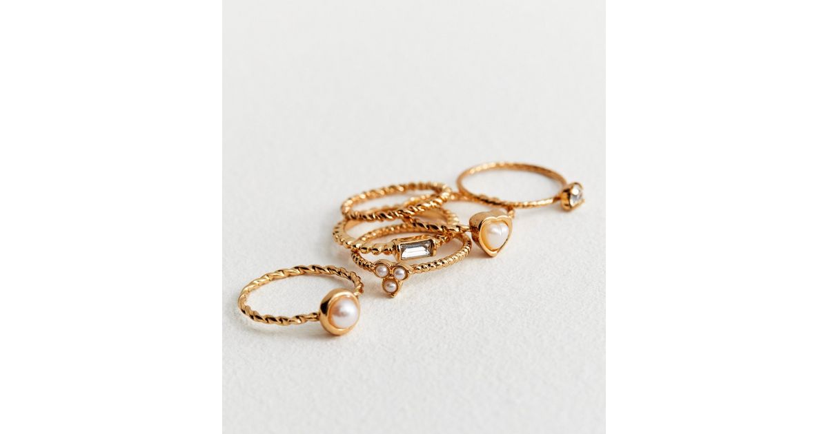 Faux Stack Rings 6 Pack Gold Faux Pearl Stacking Rings | New Look