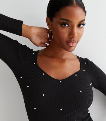 black bodysuit with pearls