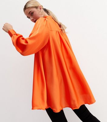orange high neck blouse