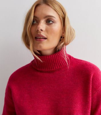 loose roll neck jumper