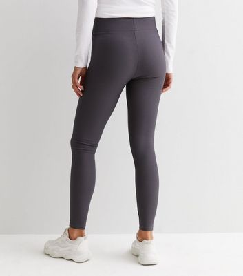 DryMove™ Pocket-detail sports tights - Dark khaki green - Ladies | H&M IN