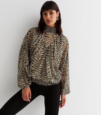brown high neck blouse
