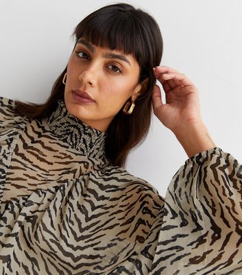 brown high neck blouse