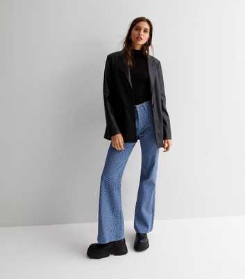 New Look 70s high waist flared jeans in mid blue