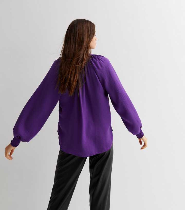 purple long sleeve blouse