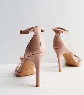 Blush colored high clearance heels