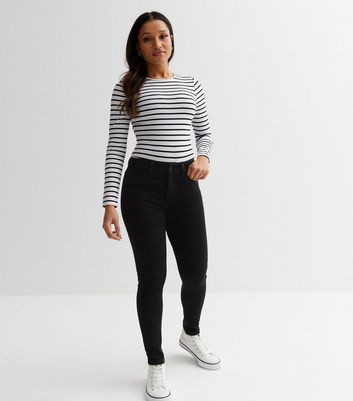 Petite Black Mid Rise Amie Skinny Jeans
