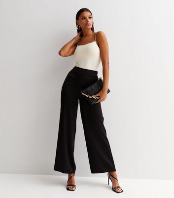 First Distraction The Label high waist satin wide leg pants in black | ASOS