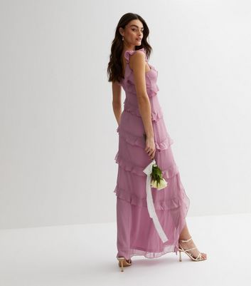 23 Ruffle Wedding Dresses That Channel A Romantic Vibe