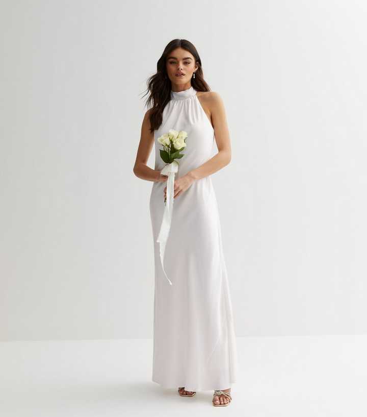 https://media2.newlookassets.com/i/newlook/850118012/womens/clothing/dresses/off-white-satin-halter-maxi-dress.jpg?strip=true&qlt=50&w=720
