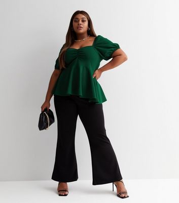 dark green peplum top