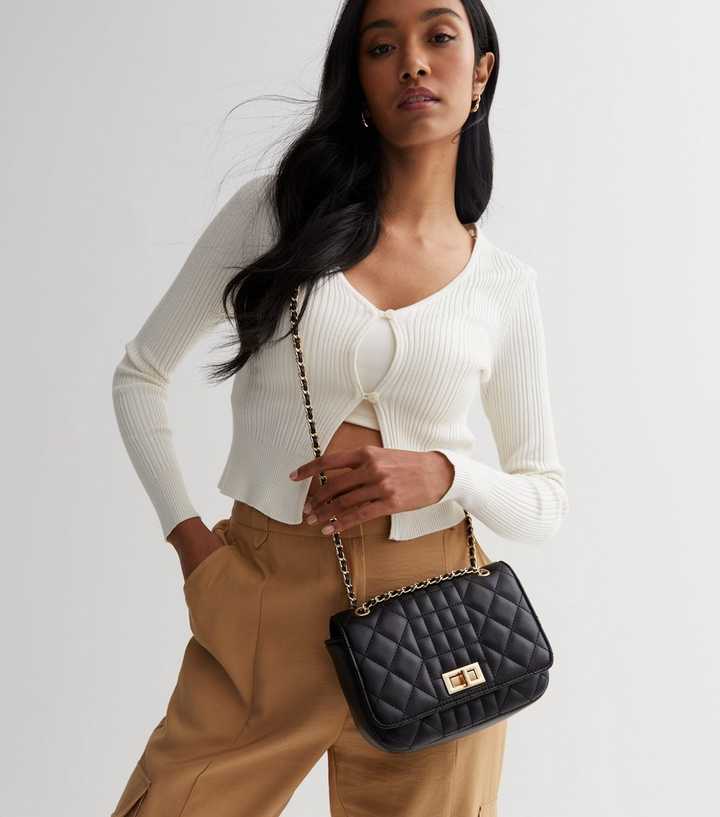 black woman with handbag