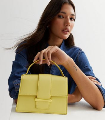 Yellow leather store cross body bag