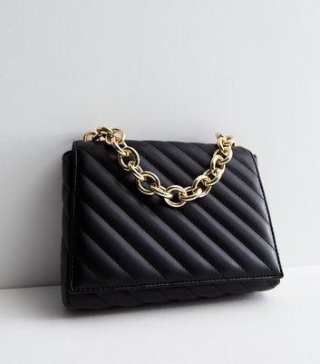 Black Diagonal Quilted Cross Body Bag New Look