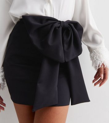 Short black skirt outlet with bow