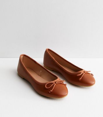 Brown shop flat pumps