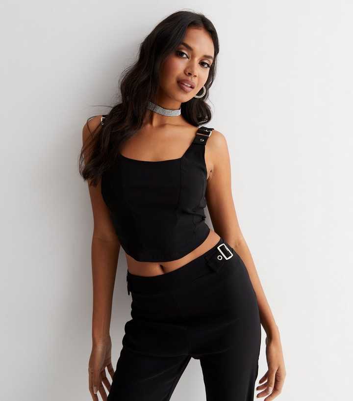 https://media2.newlookassets.com/i/newlook/851902101/womens/clothing/tops/black-buckle-corset-strappy-top.jpg?strip=true&qlt=50&w=720