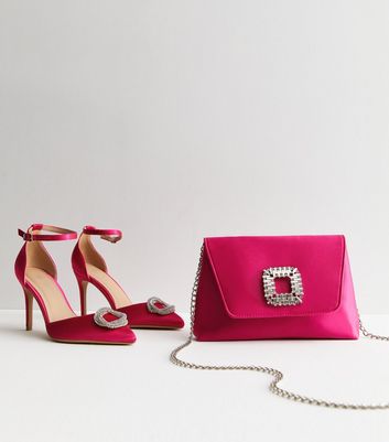 Pink heels and online clutch bag