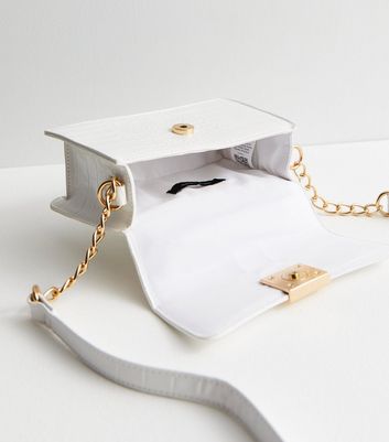 White purse with hot sale gold chain