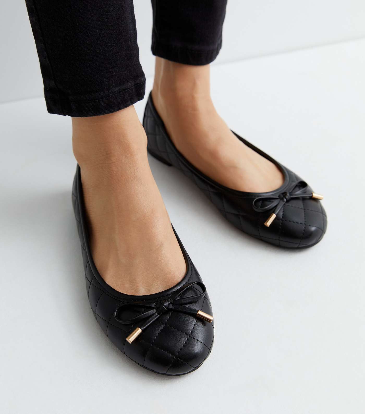 Wide Fit Black Quilted Leather-Look Bow Ballerina Pumps Image 2