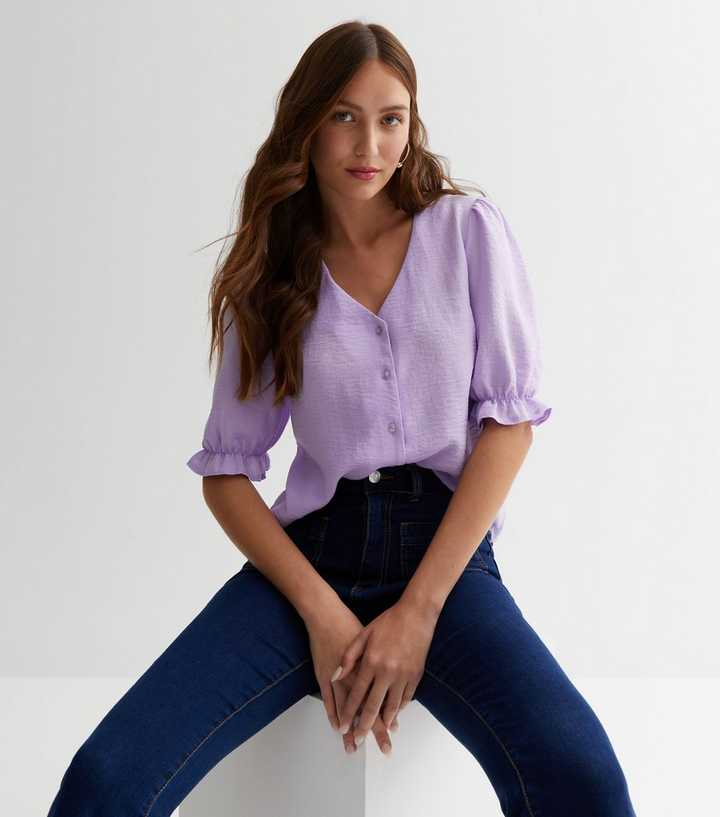 https://media2.newlookassets.com/i/newlook/852894255/womens/clothing/tops/lilac-frill-sleeve-button-front-blouse.jpg?strip=true&qlt=50&w=720
