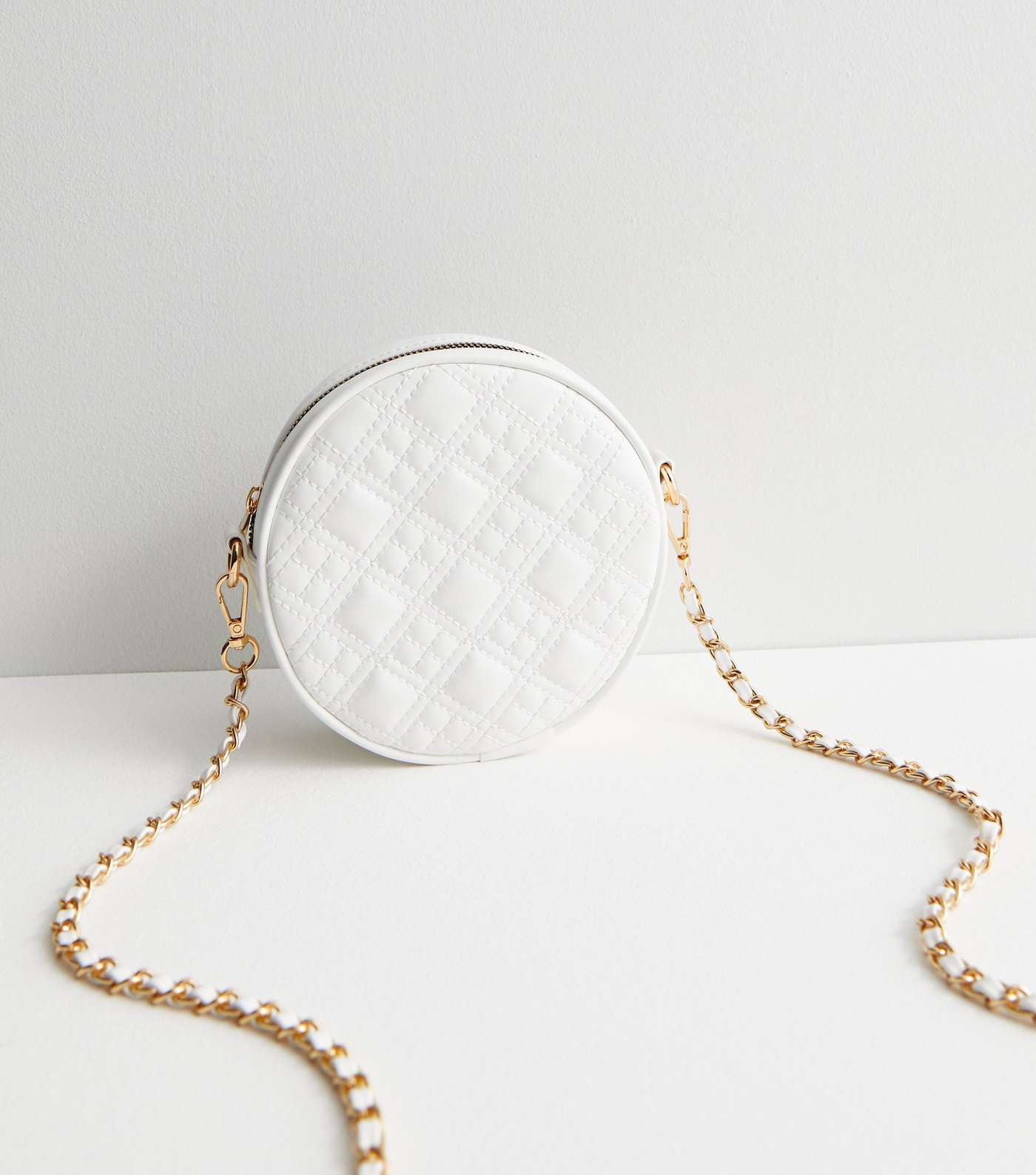 White Leather-Look Quilted Circle Cross Body Bag
