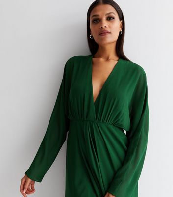 dark green plunge dress