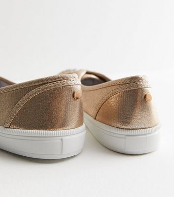 Gold metallic store slip on sneakers