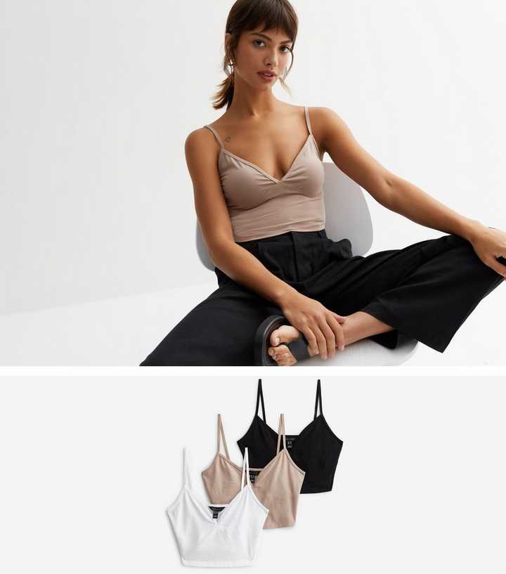 https://media2.newlookassets.com/i/newlook/854321329/womens/clothing/tops/3-pack-brown-black-and-white-bralettes.jpg?strip=true&qlt=50&w=720