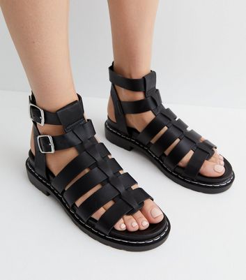 Amazon.com | Dr. Martens Women's Blaire Jelly Sandal, Black Glitter TPU &  Black Pisa, 5 | Flats