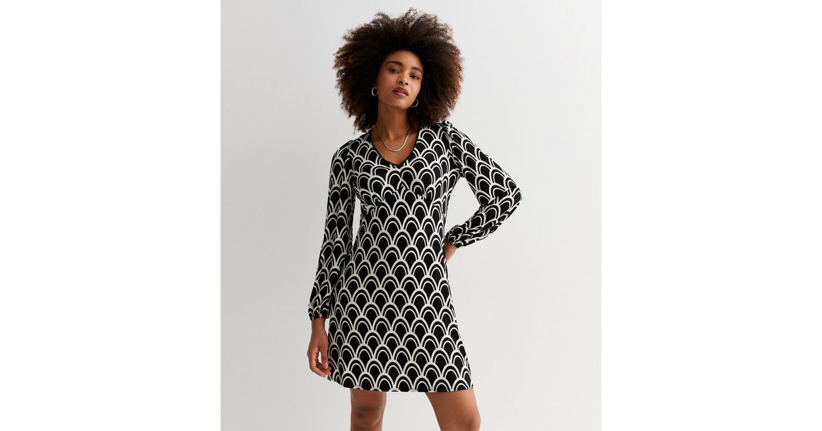 Chic Black Mini Dress with Geometric Metal Buckle and Zip Front