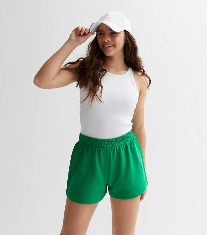 https://media2.newlookassets.com/i/newlook/856094935/girls/girls-clothing/girls-shorts/girls-green-jogger-shorts.jpg?strip=true&qlt=50&w=720