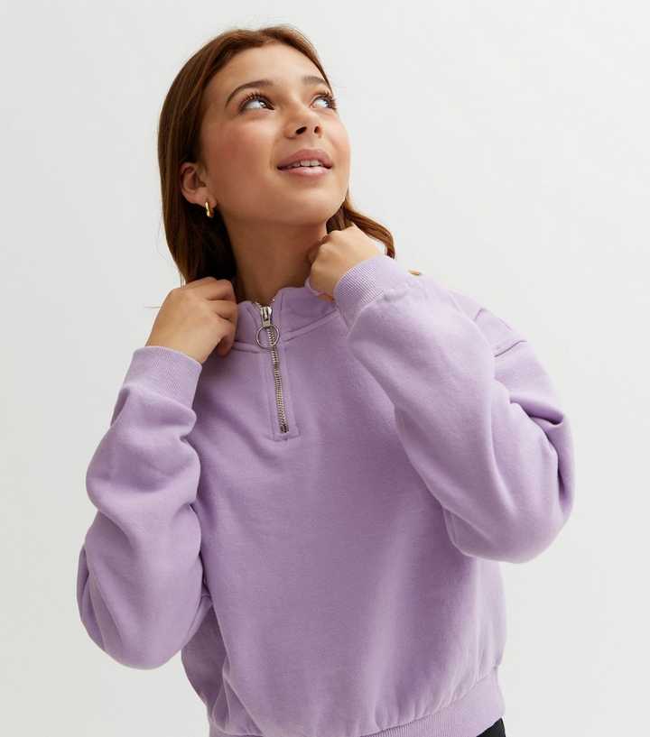 https://media2.newlookassets.com/i/newlook/856313355/girls/girls-clothing/girls-hoodies-sweatshirts/girls-lilac-acid-wash-high-neck-12-zip-sweatshirt.jpg?strip=true&qlt=50&w=720