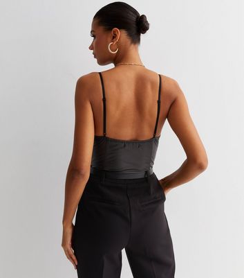 leather strappy bodysuit