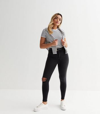 Black high waisted super skinny ripped jeans on sale