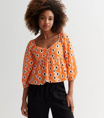 Orange store peasant blouse