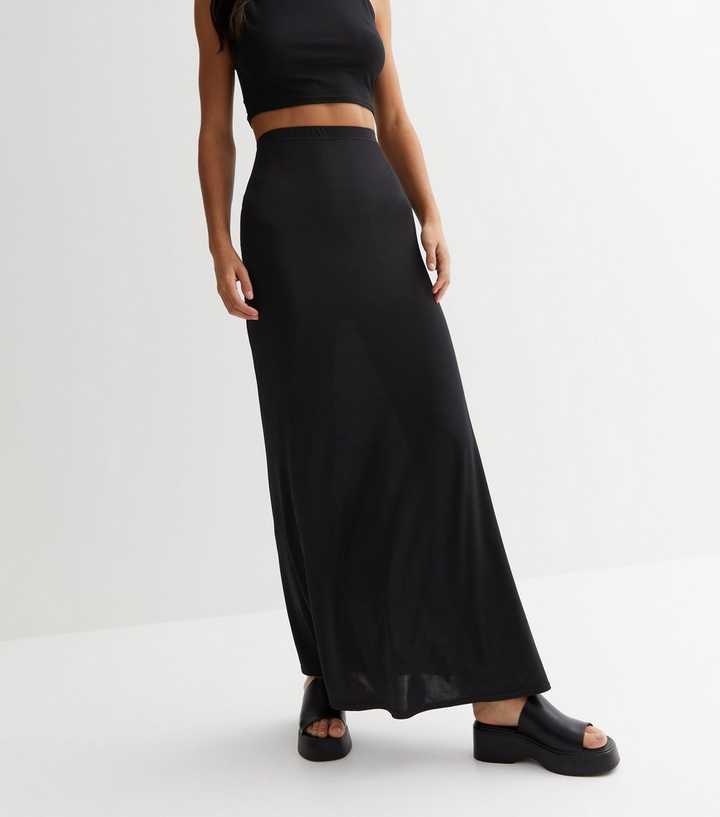 https://media2.newlookassets.com/i/newlook/858034401M1/womens/clothing/skirts/black-jersey-high-waist-maxi-skirt.jpg?strip=true&qlt=50&w=720