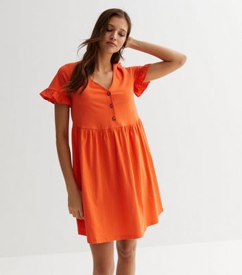 Orange dress with clearance buttons