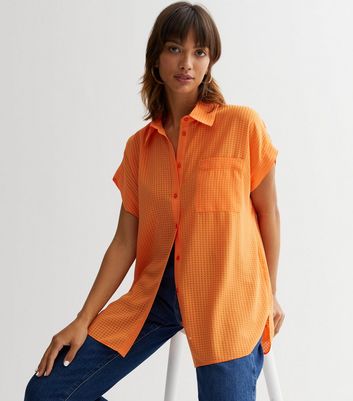 Skechers polo shirt on sale womens orange