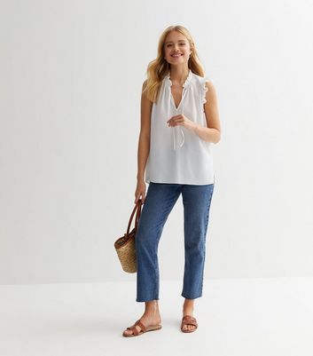 White sleeveless best sale ruffle top